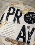 “The Lord’s Prayer” on the back of the sweatshirt